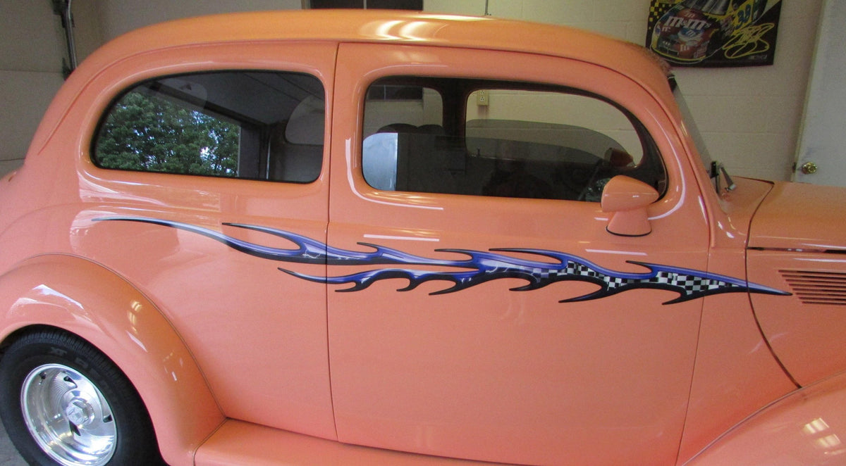 Checkers flame vinyl graphics on classic pink car